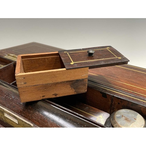 281 - A good quality early Victorian rosewood fold top writing box, with cut brass inlaid decoration, the ... 