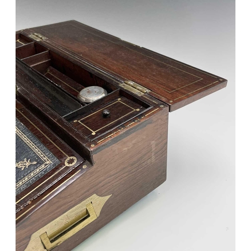 281 - A good quality early Victorian rosewood fold top writing box, with cut brass inlaid decoration, the ... 