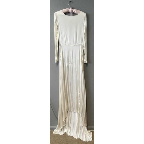 2811 - A 1920s ivory silk satin wedding dress, approximate size 6-8.