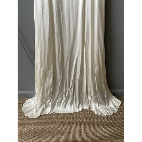 2811 - A 1920s ivory silk satin wedding dress, approximate size 6-8.