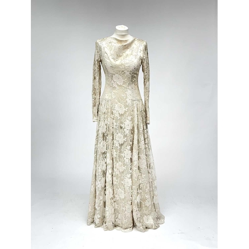 2812 - A 1950s wedding dress, duchess satin overlaid with cotton lace, approximate size 10.