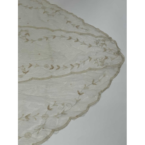 2813 - Wedding Attire - A circa 1930s tulle wedding veil with floral embroidery. Length 250cm, maximum widt... 