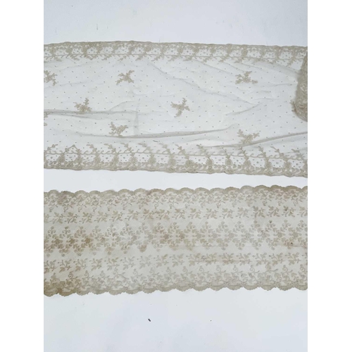 2814 - Two Edwardian heavily embroidered tulle shawls, possibly bridal, 233 x 25cm and 277 x 50cm.