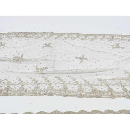 2814 - Two Edwardian heavily embroidered tulle shawls, possibly bridal, 233 x 25cm and 277 x 50cm.