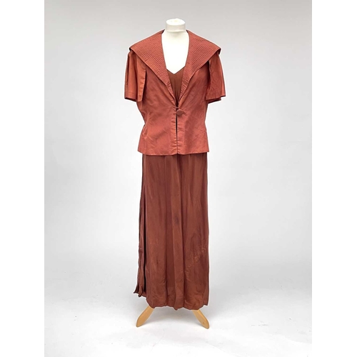 2815 - Two 1930’s evening gowns - a rust coloured taffeta dress with bolero bearing Bourne & Hollingsworth ... 