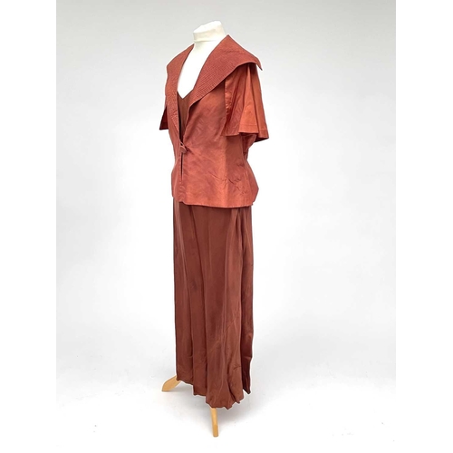 2815 - Two 1930’s evening gowns - a rust coloured taffeta dress with bolero bearing Bourne & Hollingsworth ... 