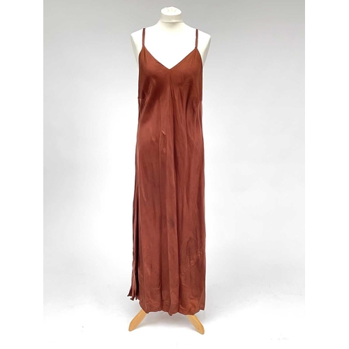 2815 - Two 1930’s evening gowns - a rust coloured taffeta dress with bolero bearing Bourne & Hollingsworth ... 