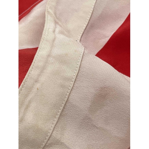 2816 - A 1970s Gucci red and white striped 100% silk blouse with embroidered logo, label size 38.