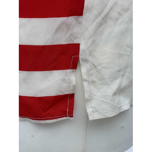 2816 - A 1970s Gucci red and white striped 100% silk blouse with embroidered logo, label size 38.