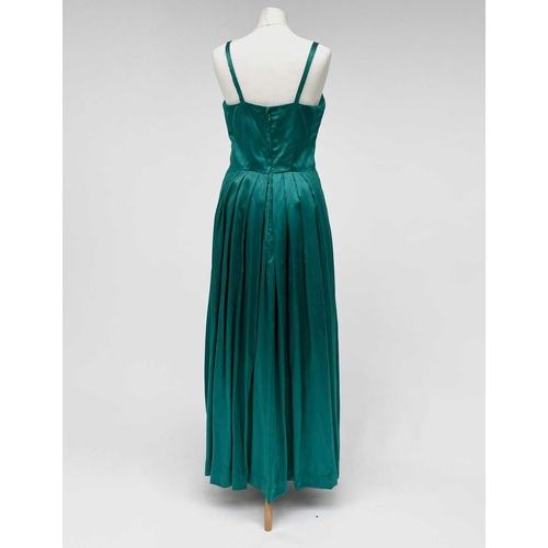 2819 - A 1960s emerald green evening dress, bearing label ‘ 'Clisoda' Model by Clive Rodney of London', app... 