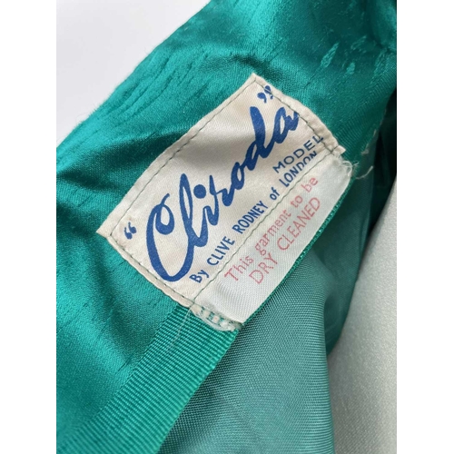 2819 - A 1960s emerald green evening dress, bearing label ‘ 'Clisoda' Model by Clive Rodney of London', app... 