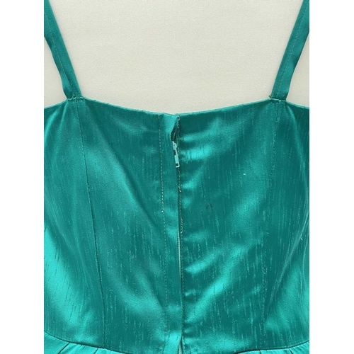 2819 - A 1960s emerald green evening dress, bearing label ‘ 'Clisoda' Model by Clive Rodney of London', app... 