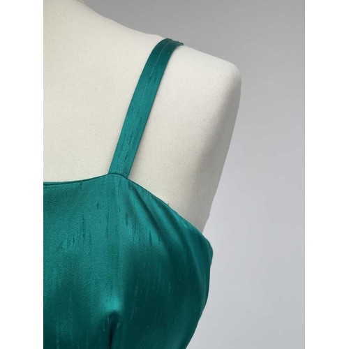 2819 - A 1960s emerald green evening dress, bearing label ‘ 'Clisoda' Model by Clive Rodney of London', app... 