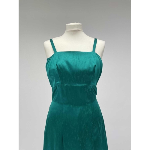 2819 - A 1960s emerald green evening dress, bearing label ‘ 'Clisoda' Model by Clive Rodney of London', app... 