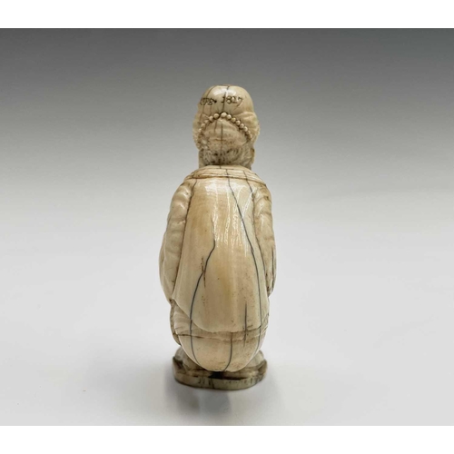 282 - A 19th century Dieppe ivory figure of a bearded man wearing a turban squatting, inscribed and dated ... 