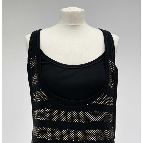 2822 - A MCQ by Alexandra McQueen sleeveless black dress, with raised gold dot horizontal banded decoration... 