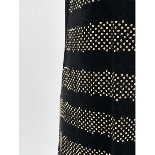 2822 - A MCQ by Alexandra McQueen sleeveless black dress, with raised gold dot horizontal banded decoration... 