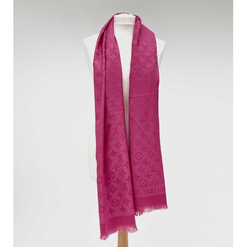 2824 - A Louis Vuitton pink monogram design cashmere and wool blend scarf, with tags. 70 x 182cm.