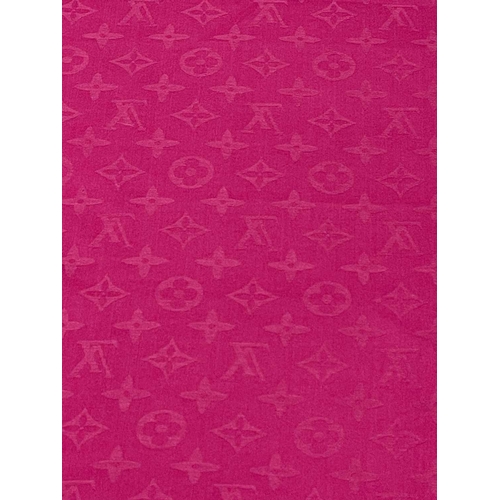 2824 - A Louis Vuitton pink monogram design cashmere and wool blend scarf, with tags. 70 x 182cm.