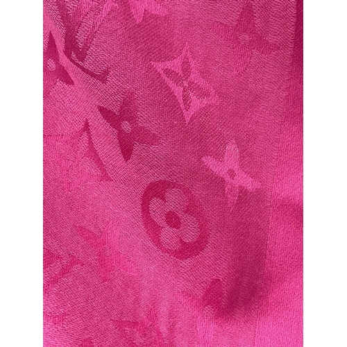 2824 - A Louis Vuitton pink monogram design cashmere and wool blend scarf, with tags. 70 x 182cm.