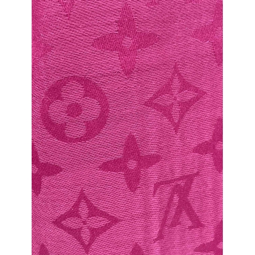 2824 - A Louis Vuitton pink monogram design cashmere and wool blend scarf, with tags. 70 x 182cm.