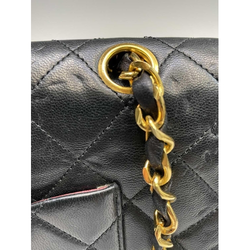 2828 - Chanel. Vintage shoulder bag. Classic Double Flap Bag. Black quilted lambskin leather with burgundy ... 