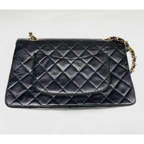 2828 - Chanel. Vintage shoulder bag. Classic Double Flap Bag. Black quilted lambskin leather with burgundy ... 