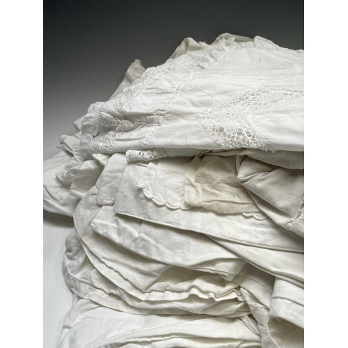 2841 - A quantity of cotton and linen pillowcases, some highly decorative, mostly pairs, in one box.