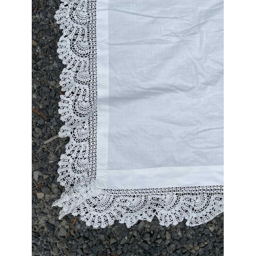 2845 - A white cotton counterpane with floral embroidery, 220 x 220cm approx. plus 10 cms crotchet trimming... 