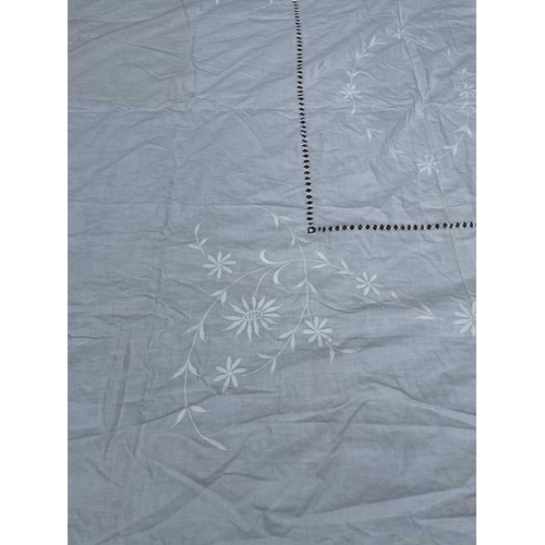 2845 - A white cotton counterpane with floral embroidery, 220 x 220cm approx. plus 10 cms crotchet trimming... 