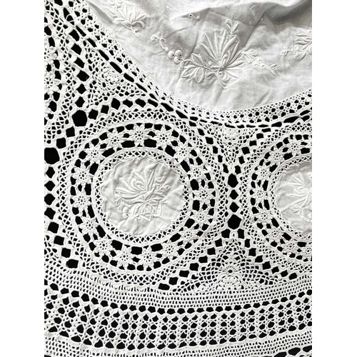 2847 - A quantity of lace handworked tablecloths including one circular cloth, plus doilies etc.