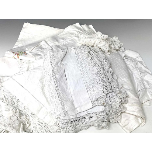 2847 - A quantity of lace handworked tablecloths including one circular cloth, plus doilies etc.