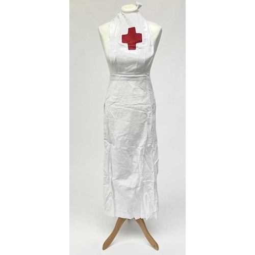 2849 - A collection of nurses' aprons and caps, VAD WW1 and WW2.