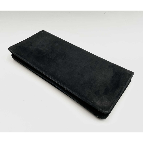 2851 - One black suede clutch bag and one other shoulder bag. The clutch with large interior compartment an... 