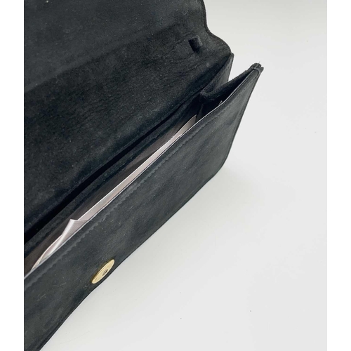 2851 - One black suede clutch bag and one other shoulder bag. The clutch with large interior compartment an... 