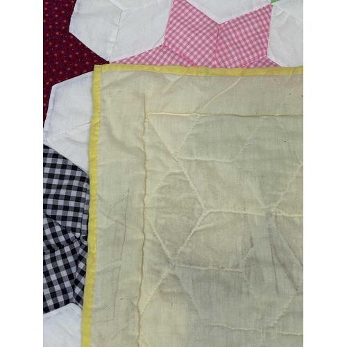 2853 - Patchwork quilts. Two quilts, in light colours and mixed plain, ginghams and floral fabrics. One wit... 