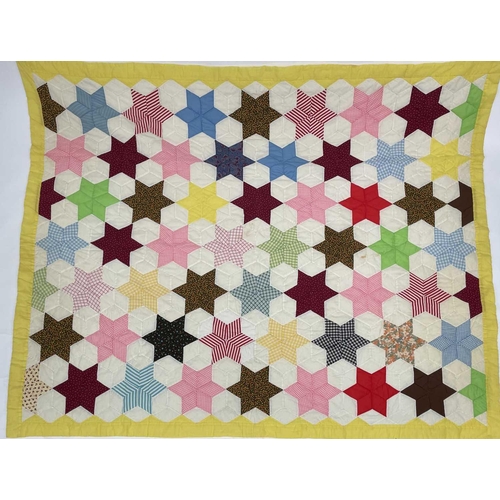 2853 - Patchwork quilts. Two quilts, in light colours and mixed plain, ginghams and floral fabrics. One wit... 