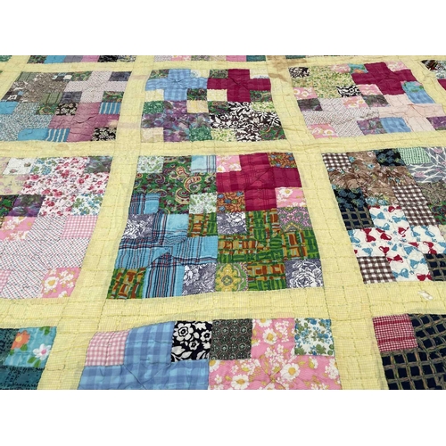 2855 - Patchwork quilts. One quilt with predominantly square and rectangular patches in multi coloured 1950... 