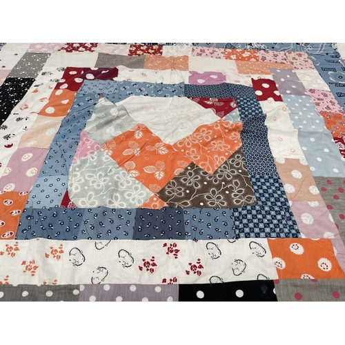 2855 - Patchwork quilts. One quilt with predominantly square and rectangular patches in multi coloured 1950... 