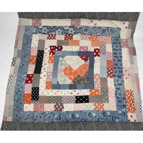 2855 - Patchwork quilts. One quilt with predominantly square and rectangular patches in multi coloured 1950... 