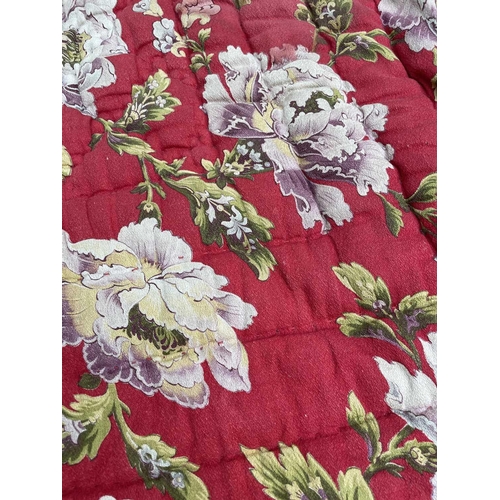 2857 - A heavy and thick red floral quilt together with a machine made tapestry style panel. The quilt 210x... 