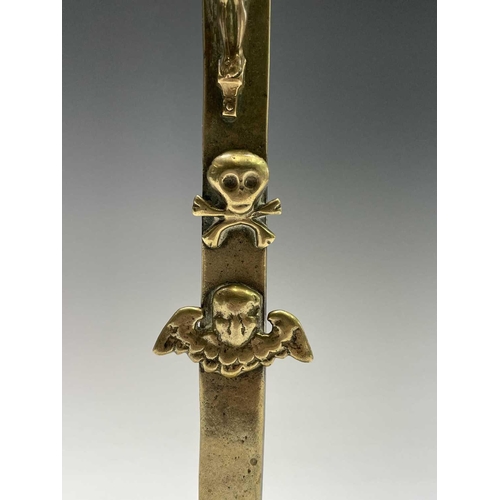 286 - A brass altar crucifix, cast with the figure of Christ beneath an INRI scroll, cherubim, and a skull... 