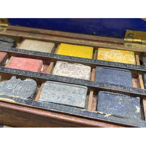 287 - A Winsor & Newton mahogany artists travel box, 19th century, with removable tray for watercolors and... 