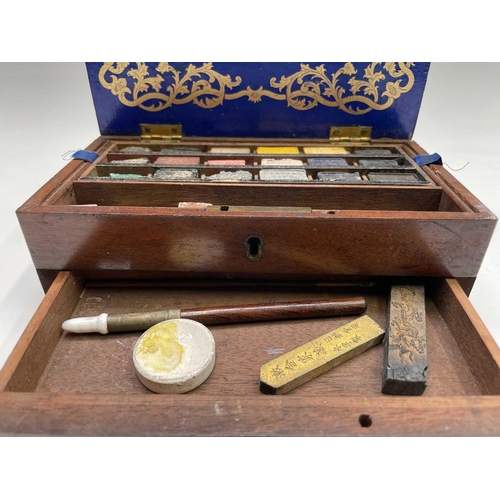 287 - A Winsor & Newton mahogany artists travel box, 19th century, with removable tray for watercolors and... 