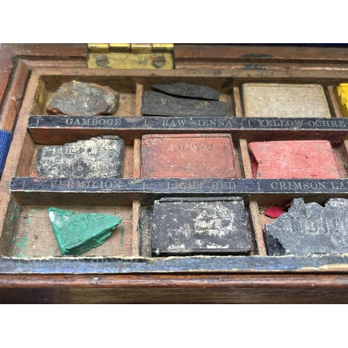 287 - A Winsor & Newton mahogany artists travel box, 19th century, with removable tray for watercolors and... 