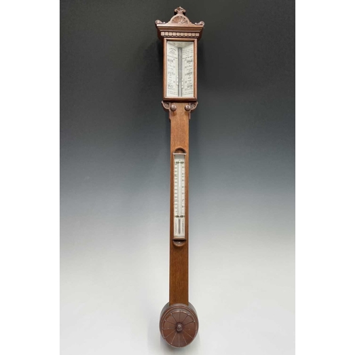 2902 - A Victorian walnut stick barometer, by J Hicks, London, with ivory scales, twin vernier indicators f... 