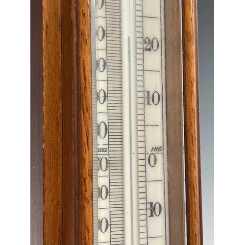 2902 - A Victorian walnut stick barometer, by J Hicks, London, with ivory scales, twin vernier indicators f... 