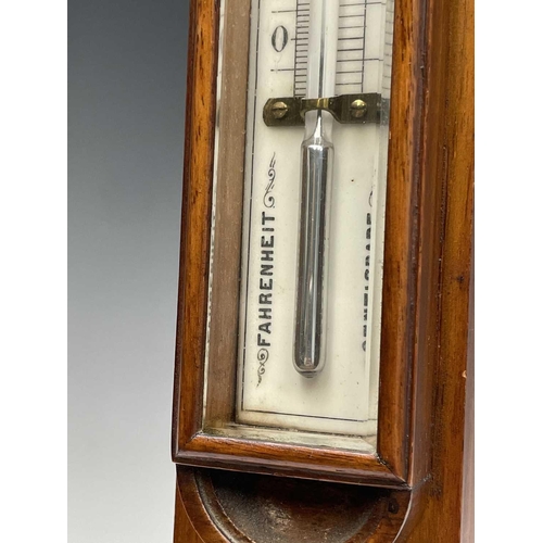 2902 - A Victorian walnut stick barometer, by J Hicks, London, with ivory scales, twin vernier indicators f... 