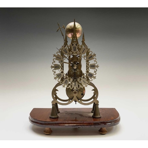 2909 - A brass cathedral skeleton clock, 20th century, with single fusee movement, striking on a bell, maho... 