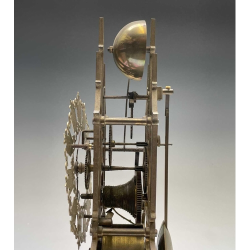 2909 - A brass cathedral skeleton clock, 20th century, with single fusee movement, striking on a bell, maho... 